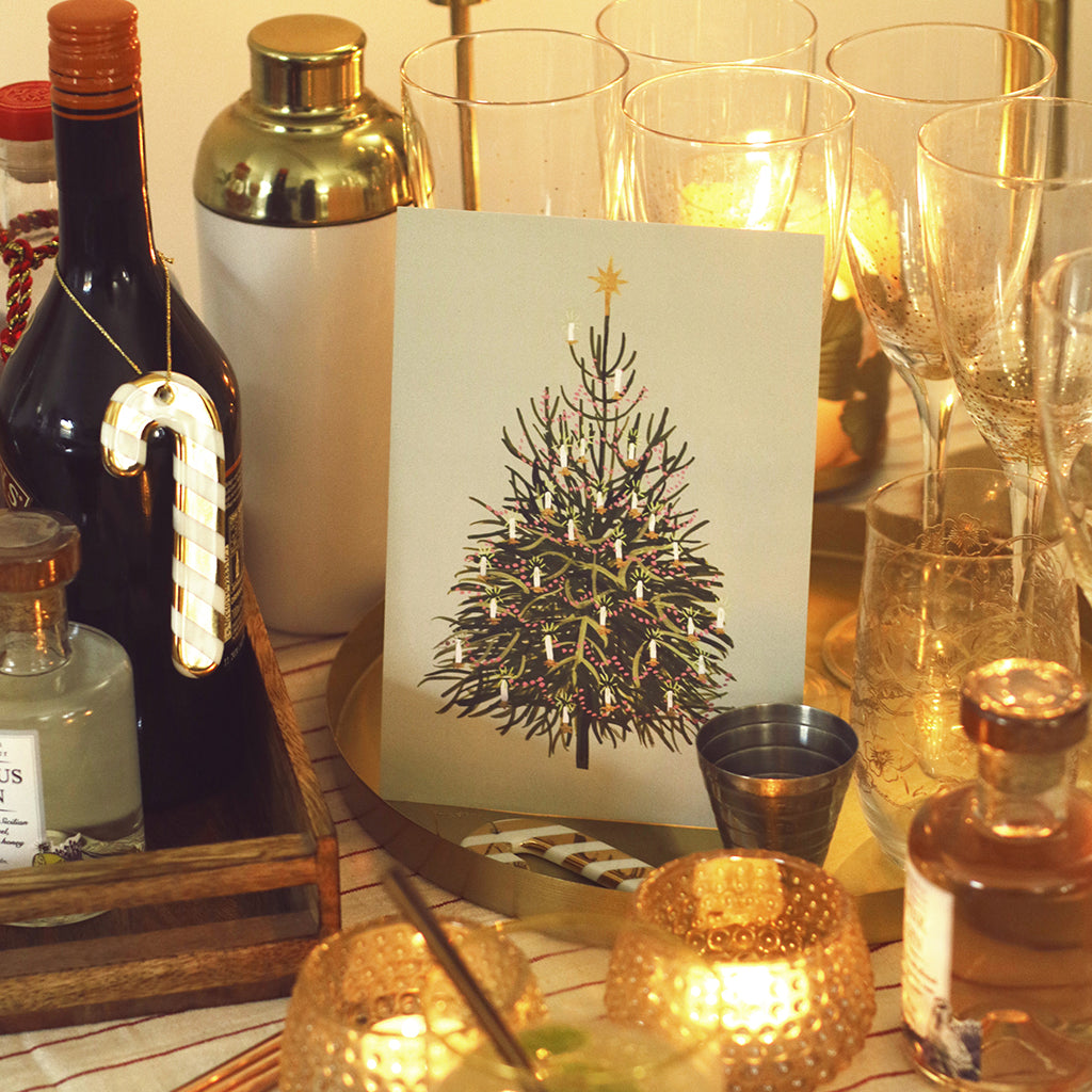 the mini christmas tree print adding some festive touches to the cocktail cart