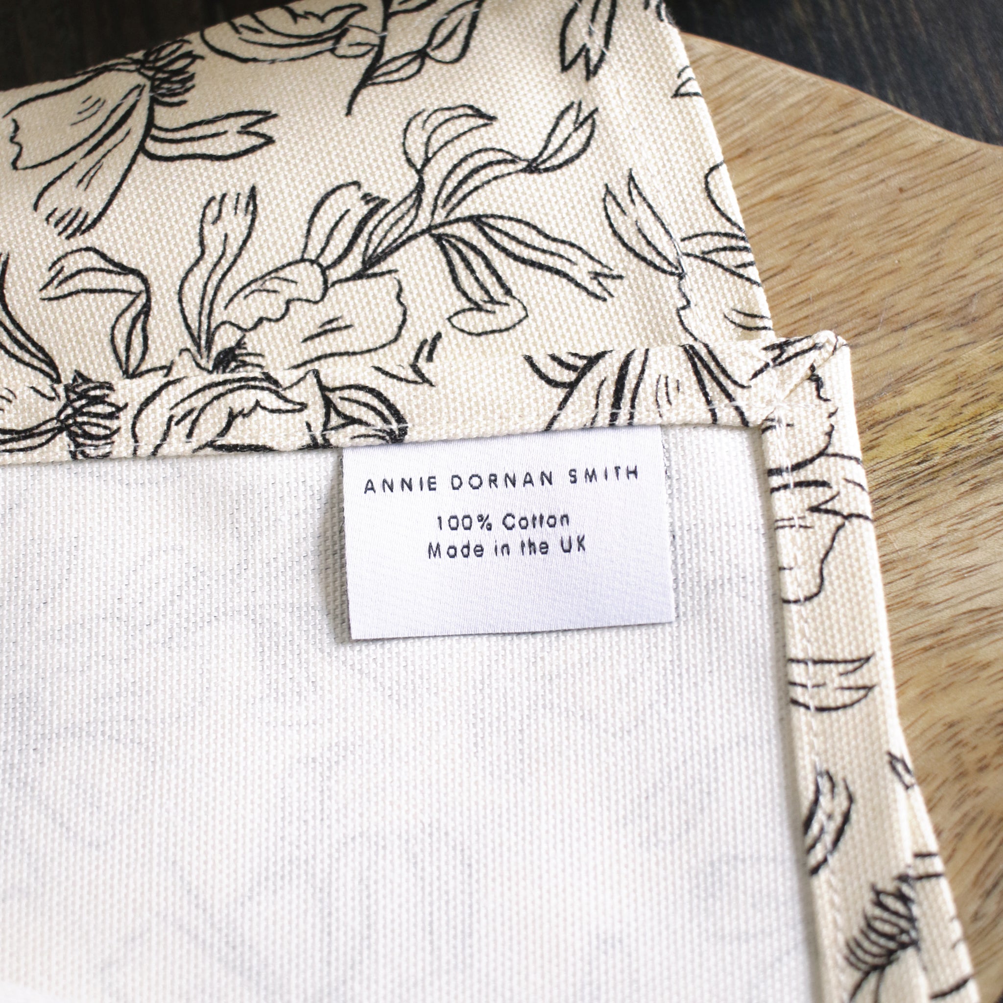 100% Cotton, Make in the UK Tea Towel, close up of label