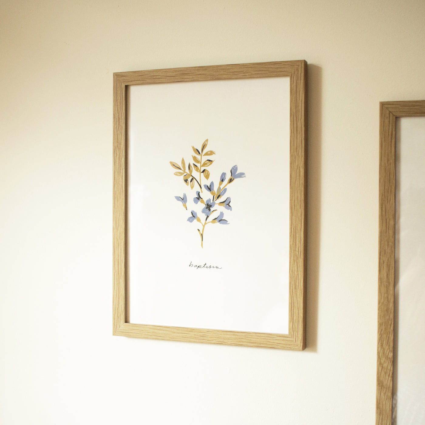 blue flower baptisia print in an oak frame