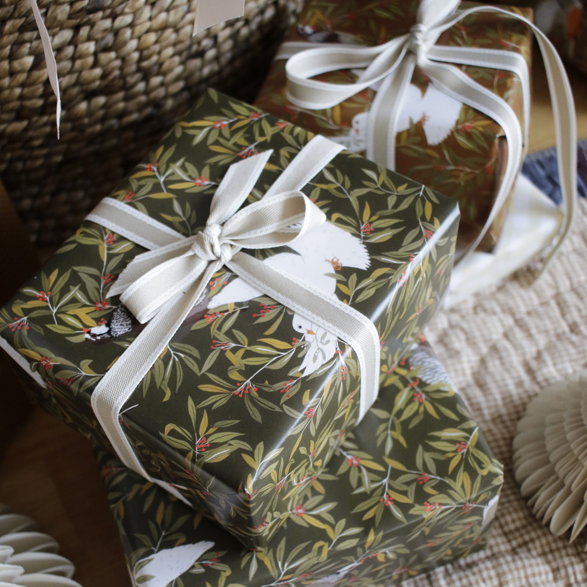 Christmas wrapping paper - dark green birds on foliage