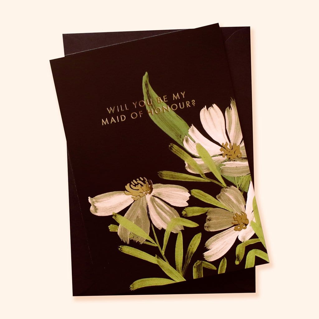 A Floral A6 Card With White And Green Flowers With Will You Be My Maid Of Honour In Gold Lettering  With Black Envelope - Annie Dornan Smith