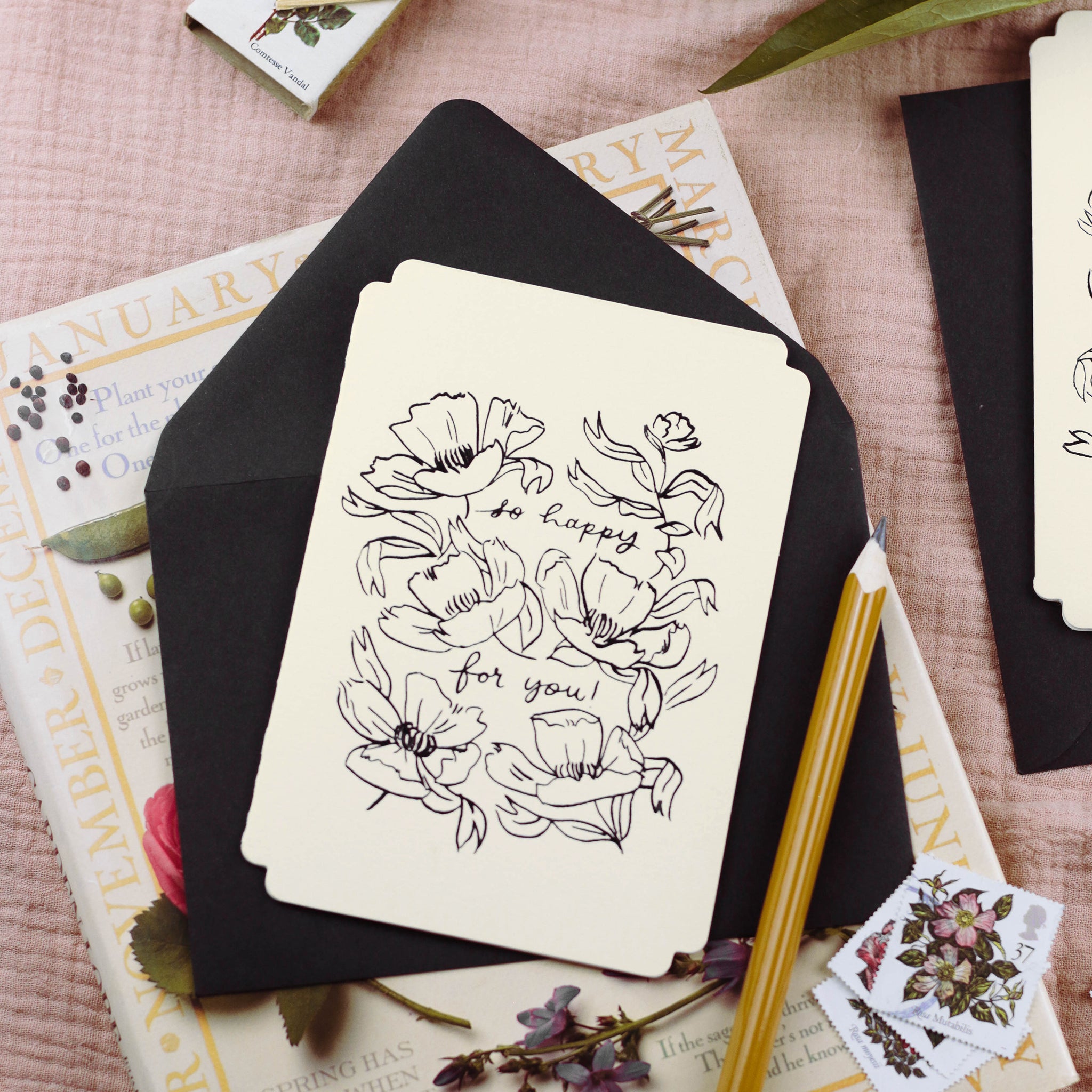 a floral congratuations card in a vintage-inspired die-cut shape. Reads "so happy for you!" - Annie Dornan Smith