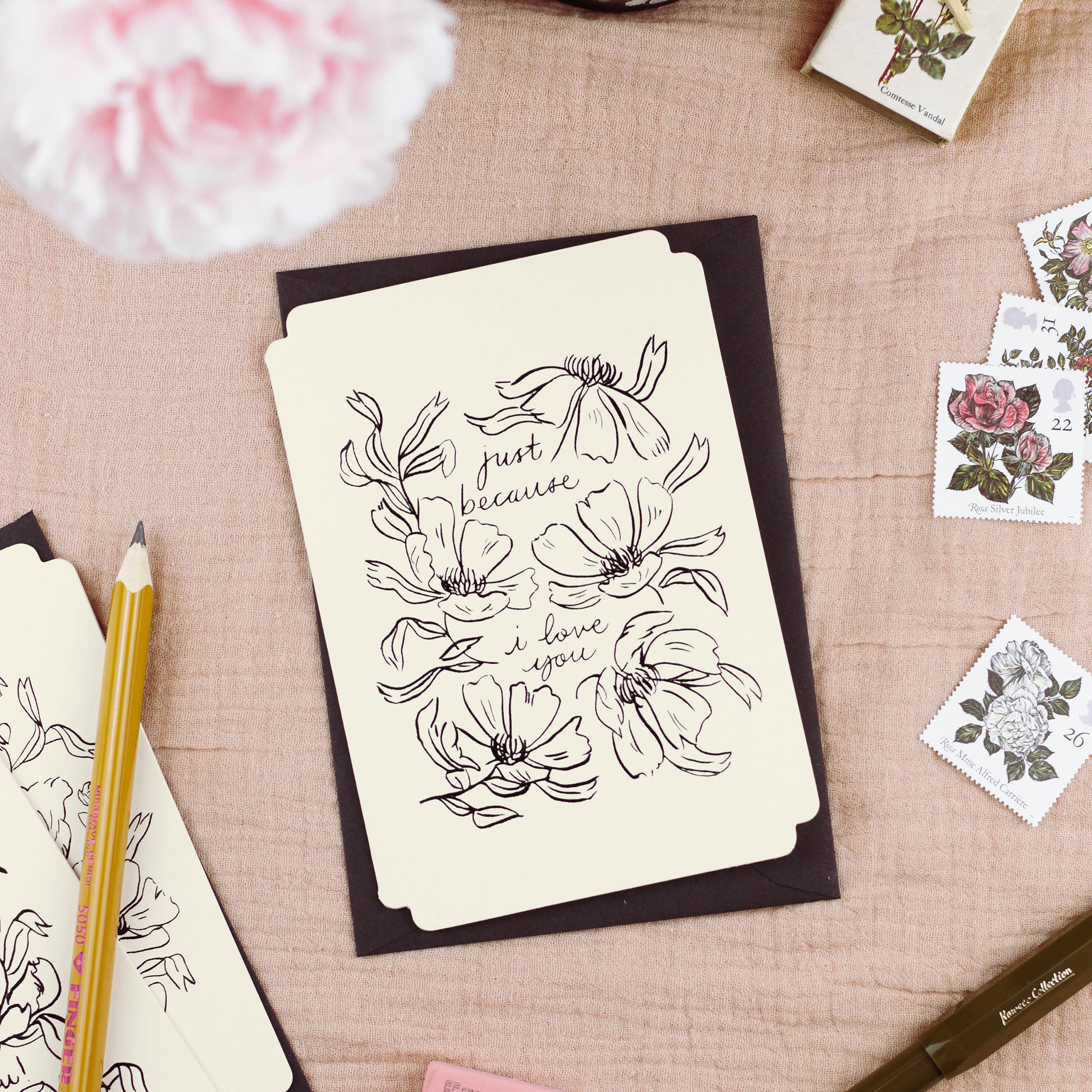 A floral "just because" card, styled with black envlope and writing implements.  - Annie Dornan Smith