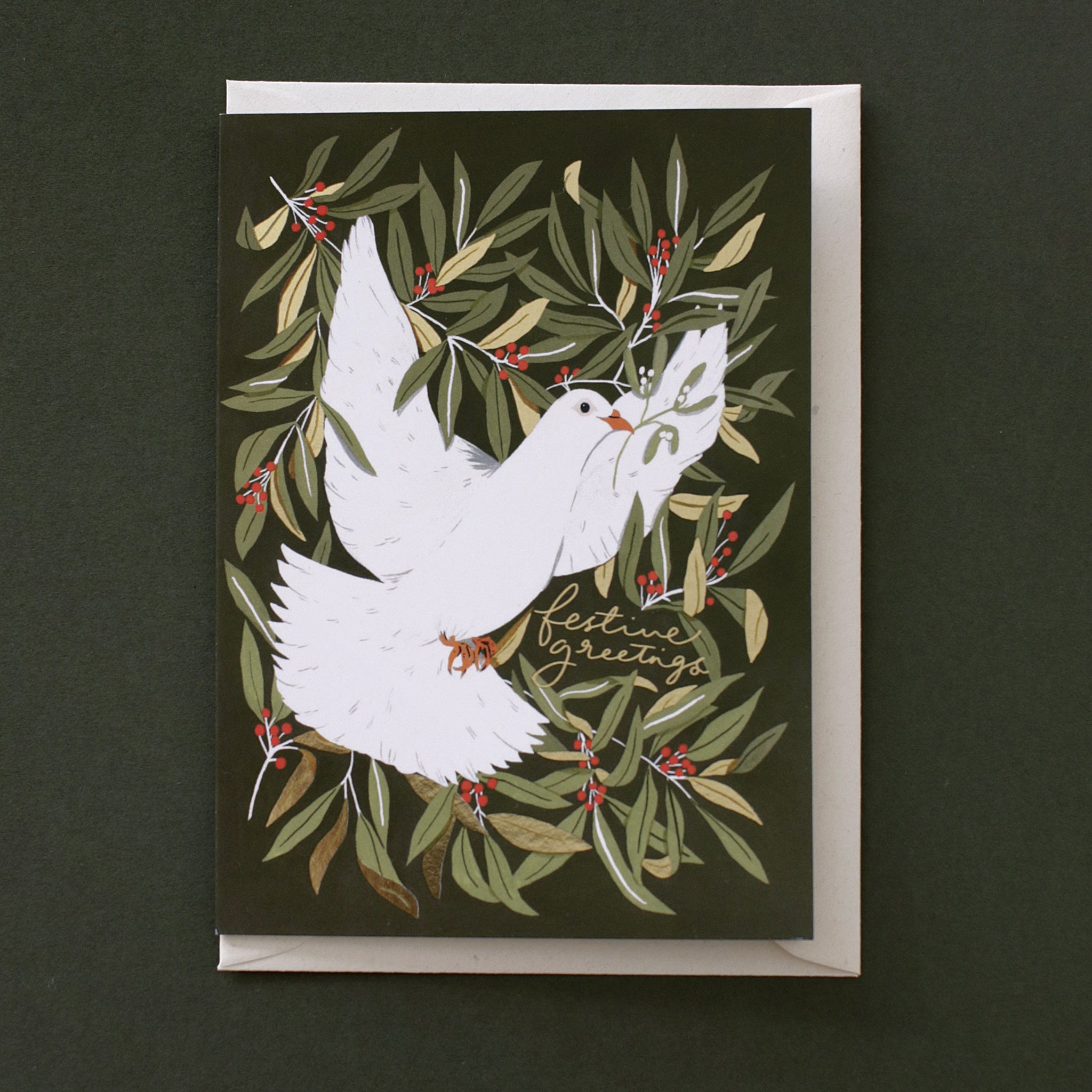 A beautiful, deep-green Christmas card with an illustrated bird design. It is finished with lovely gold foil details, and comes with a recycled cream envelope.