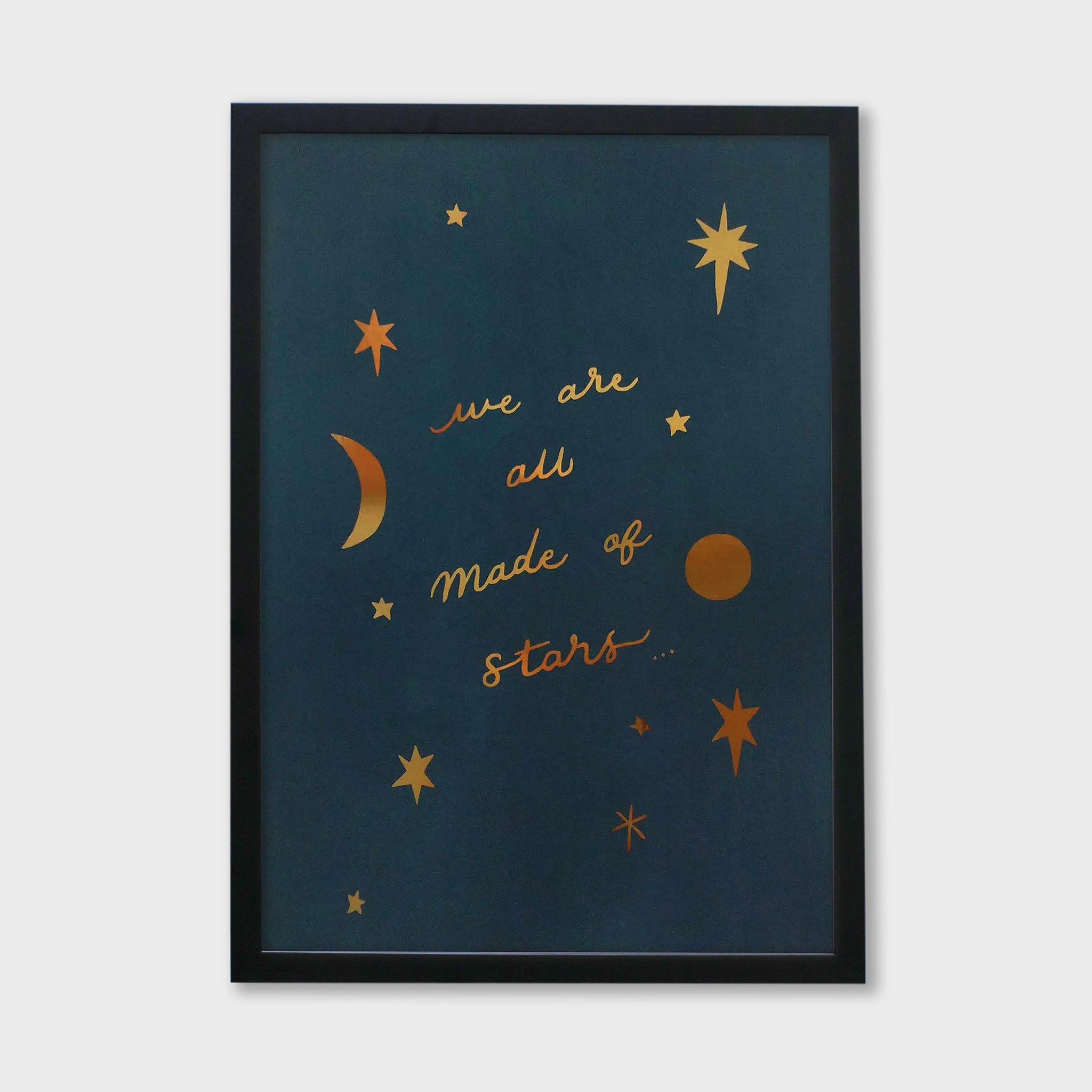 made of stars gold foil print in black frame