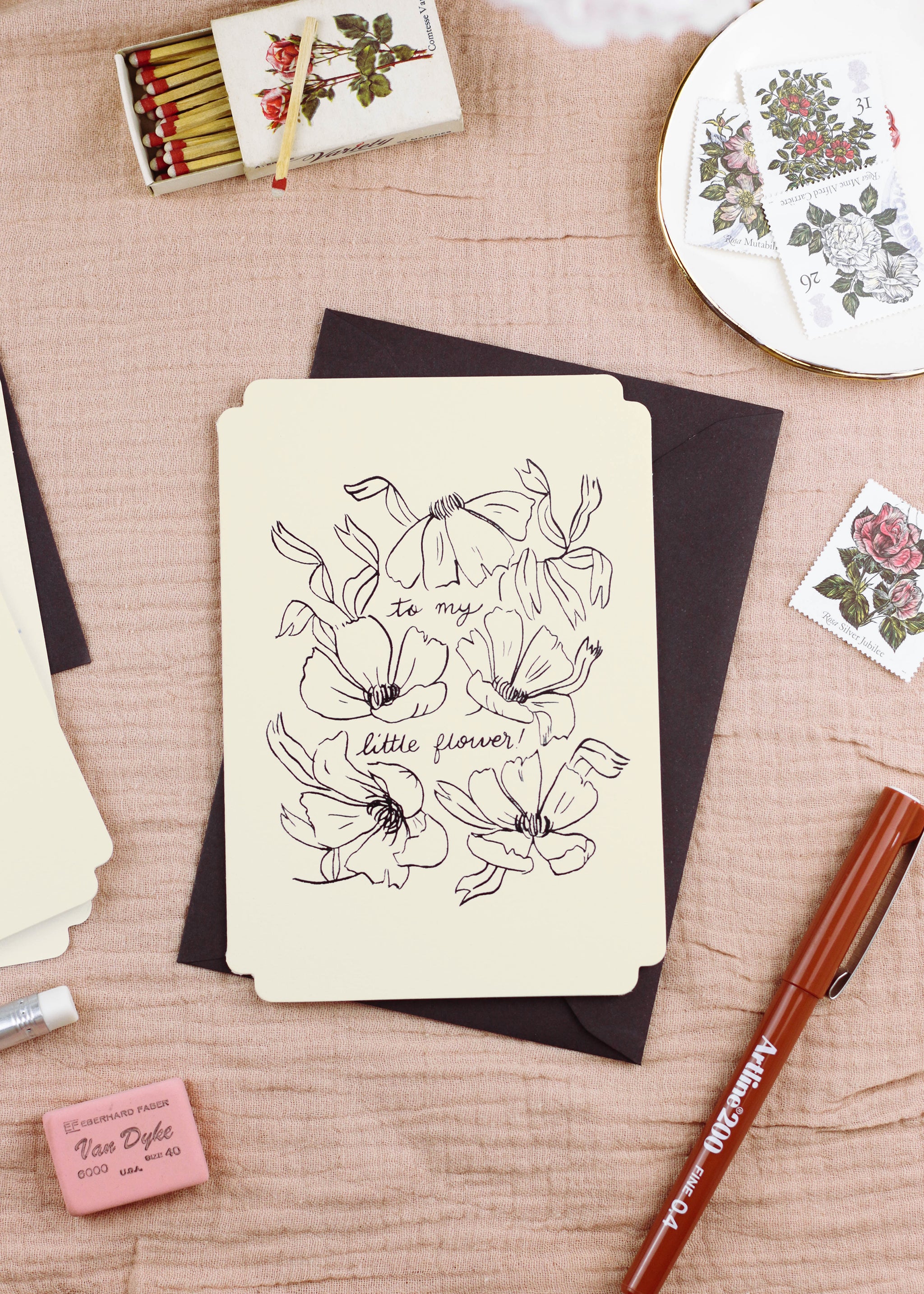 a floral daughter / granddaughter card, styled with a black envelope, vintage stamps and writing accoutrements. Black Line Floral Art Print Love You Beautiful In A Black Frame - Annie Dornan Smith