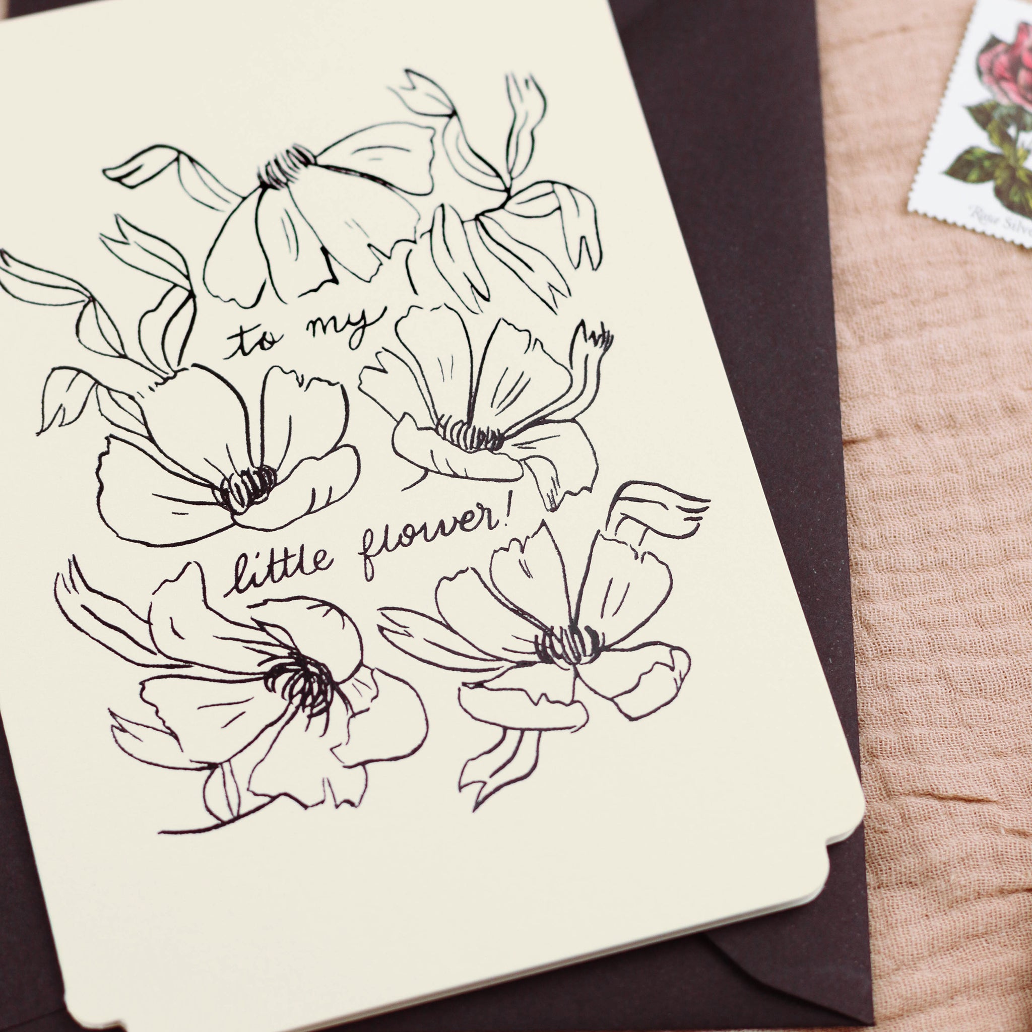 detail of the black, embossed foiling Black Line Floral Art Print Love You Beautiful In A Black Frame  - Annie Dornan Smith