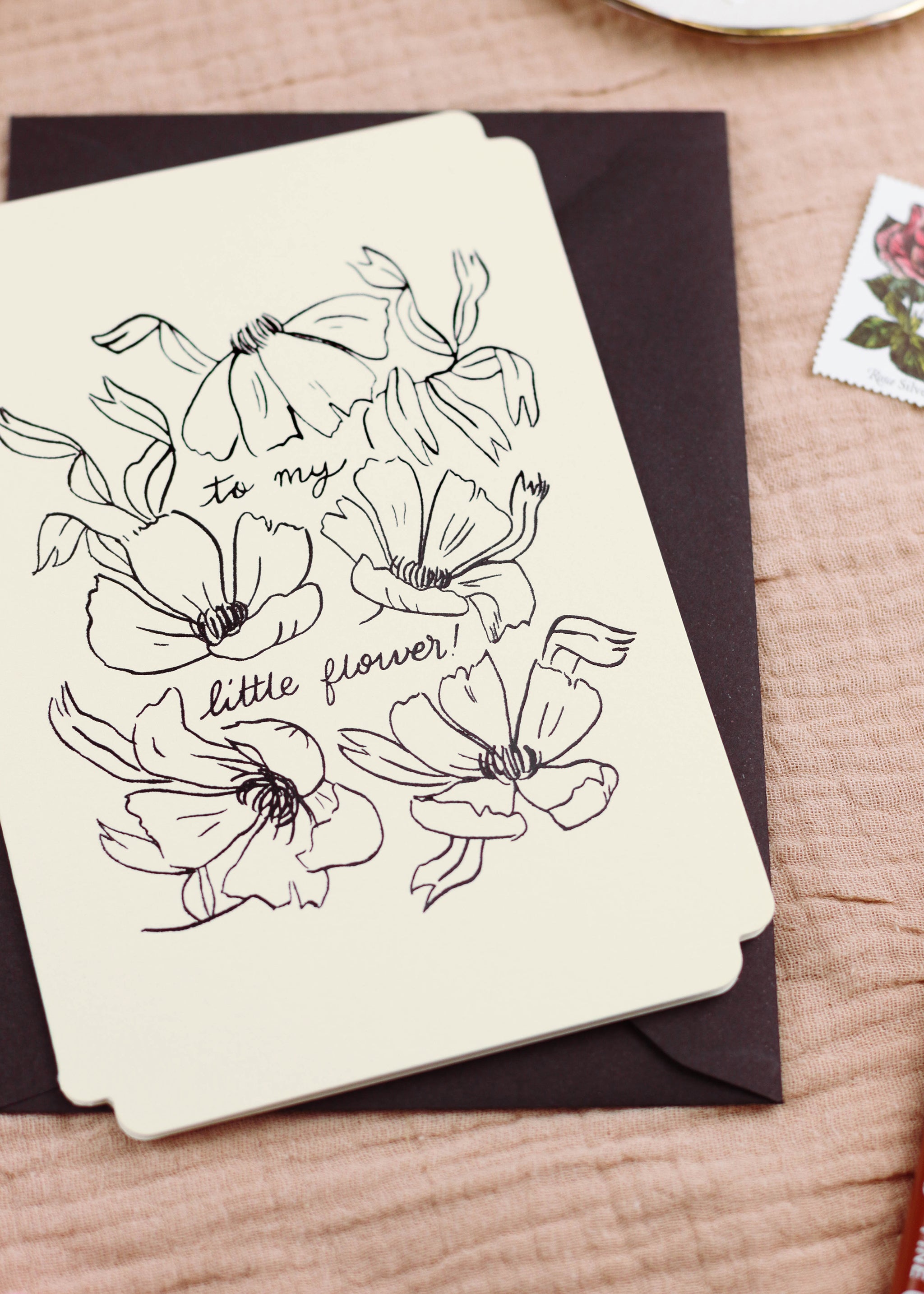 detail of the black, embossed foiling Black Line Floral Art Print Love You Beautiful In A Black Frame - Annie Dornan Smith