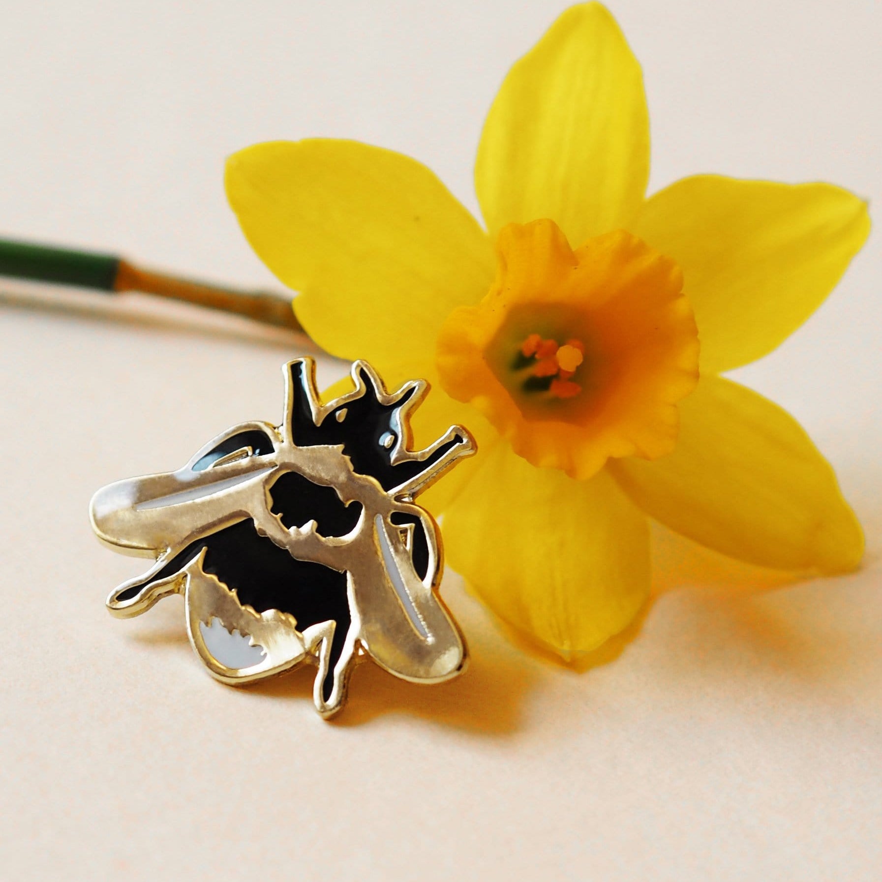 British Bee Gold Enamel Pin On Yellow Daffodil - Annie Dornan Smith