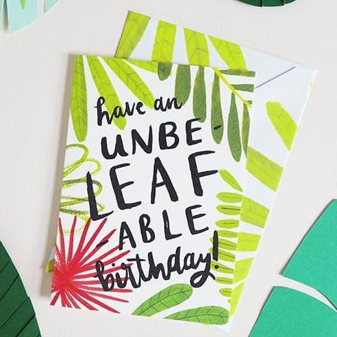An Illustrated Leaf Greeting Card With The Words Have An Unbeleafable Birthday In Brush Lettering - Annie Dornan Smith
