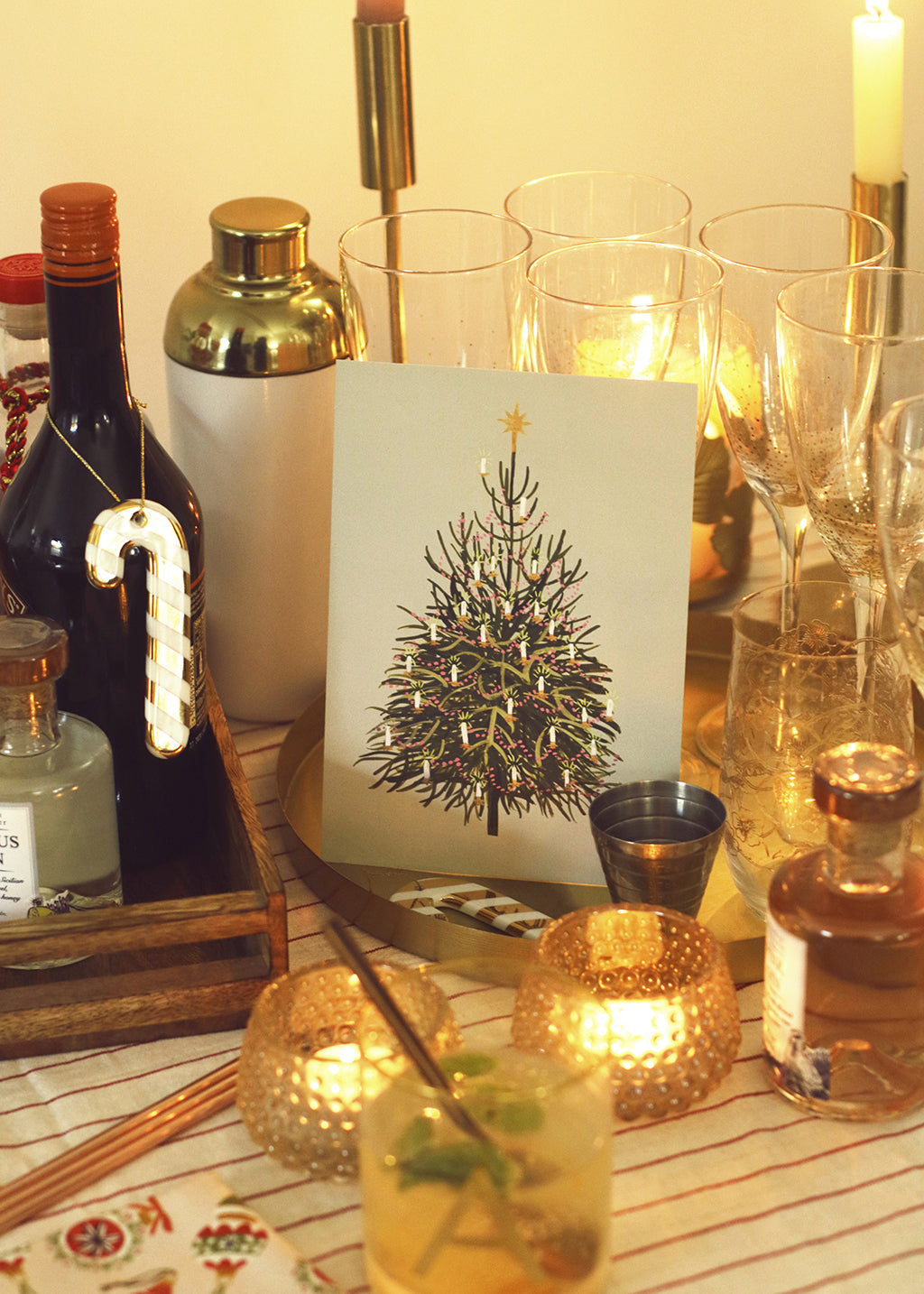 the mini christmas tree print adding some festive touches to the cocktail cart