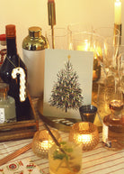 the mini christmas tree print adding some festive touches to the cocktail cart