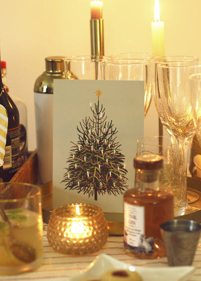 the christmas tree mini print nestled amongst the christmas drinks table