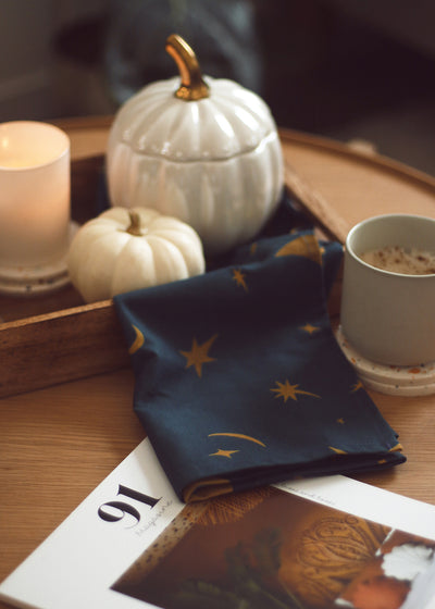 a magical, moon and star patterned kitchen tea towel