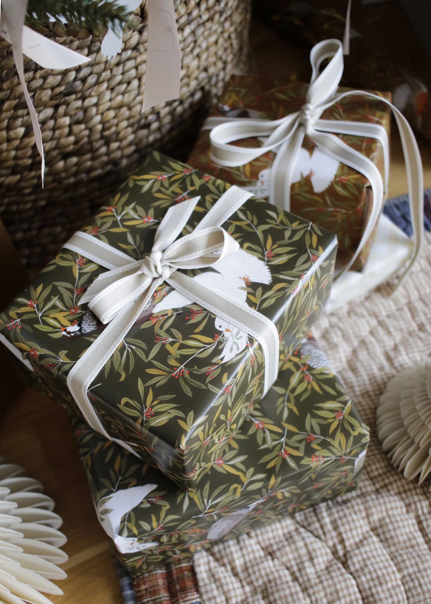 Christmas wrapping paper - dark green birds on foliage