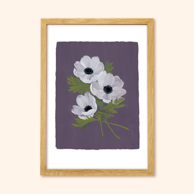 A Botanical Print With A Stem Of With Anemones On A Purple Background In A Light Oak Frame - Annie Dornan Smith