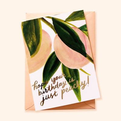 Illustrated Peach and Green Leaf A6 Card With Hope Your Birthday Is Just Peachy In Gold Lettering With Peach Envelope - Annie Dornan Smith