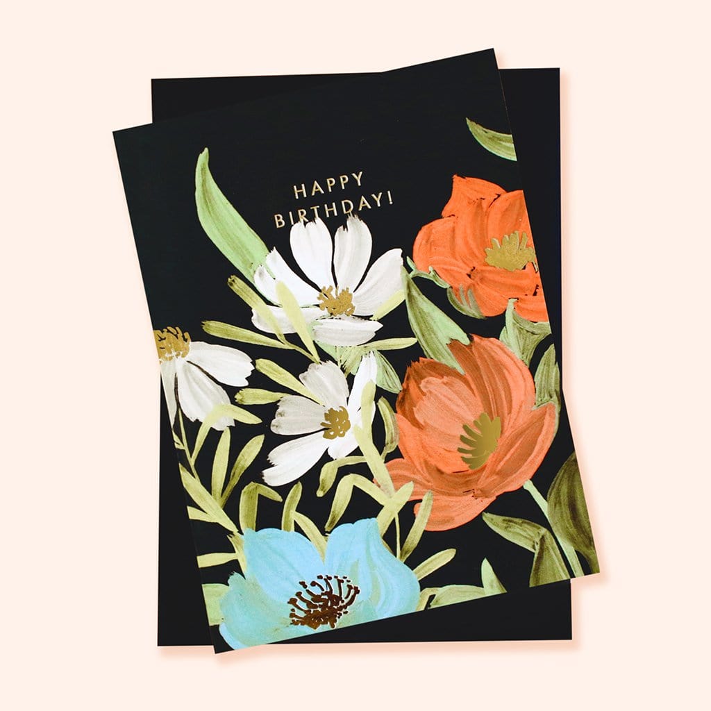 Illustrated Black Floral Card With White Orange And Blue Flowers And Gold Happy Birthday Lettering - Annie Dornan Smith