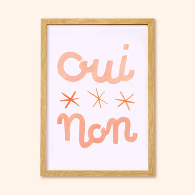 Typographic Print With The Words Oui Non And Three Stars In Peach In An Oak Frame - Annie Dornan Smith