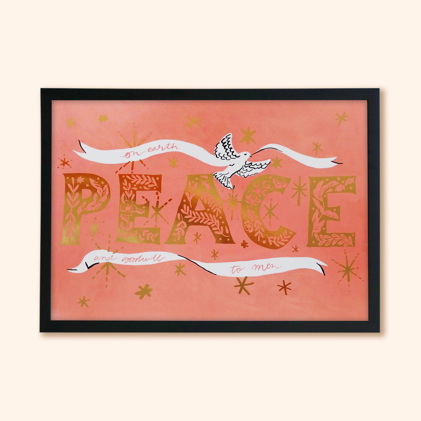 "PEACE" in gold lettering on a pink background, inside a black wood frame