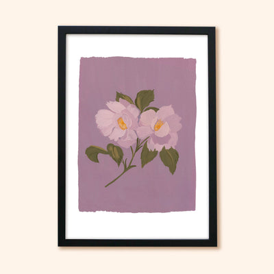 An illustrated floral print of purple roses in a black wooden frame