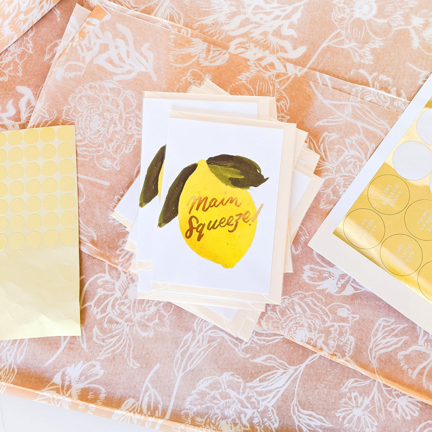 Illustrated Lemon and Green Leaf A6 Card With Main Squeeze In Gold Lettering With Pale Yellow Envelope On Patterned Tissue Paper - Annie Dornan Smith