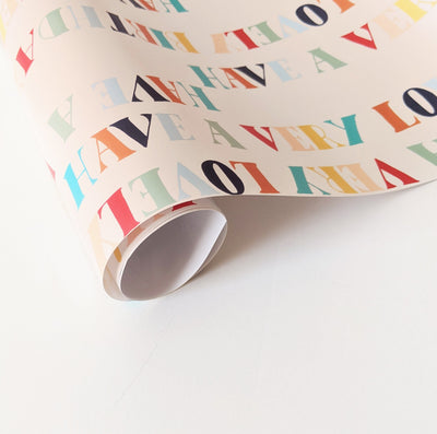 Rolled Full Colour Wrapping Paper With Have A Very Lovely Birthday In Rainbow Colours - Annie Dornan Smith