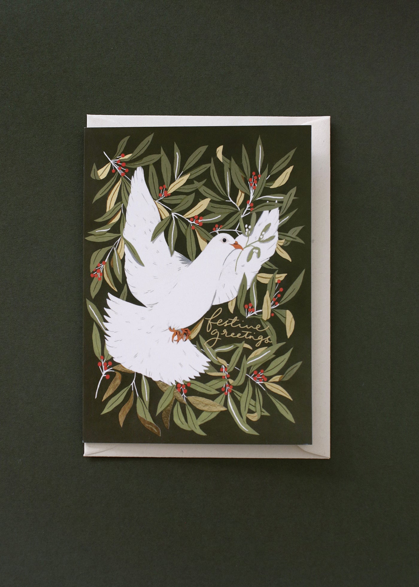 A beautiful, deep-green Christmas card with an illustrated bird design. It is finished with lovely gold foil details, and comes with a recycled cream envelope.