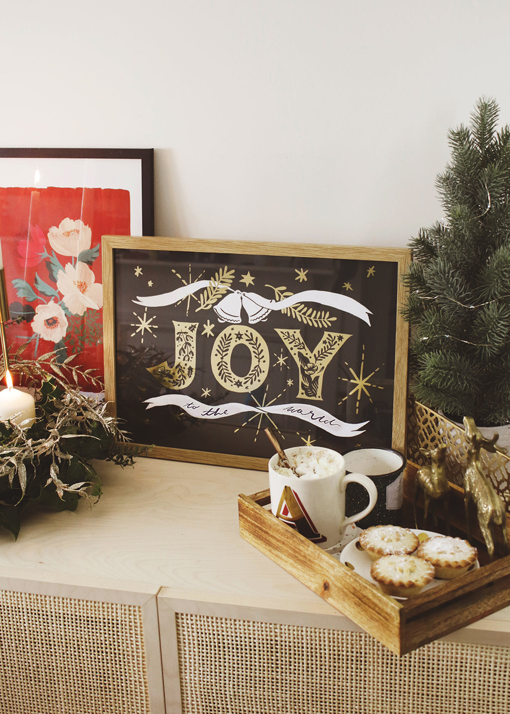 Navy Christmas Print With Gold Joy Lettering And Stars In An Oak Frame With Tray Of Mince Pies And Hot Chocolate - Annie Dornan Smith