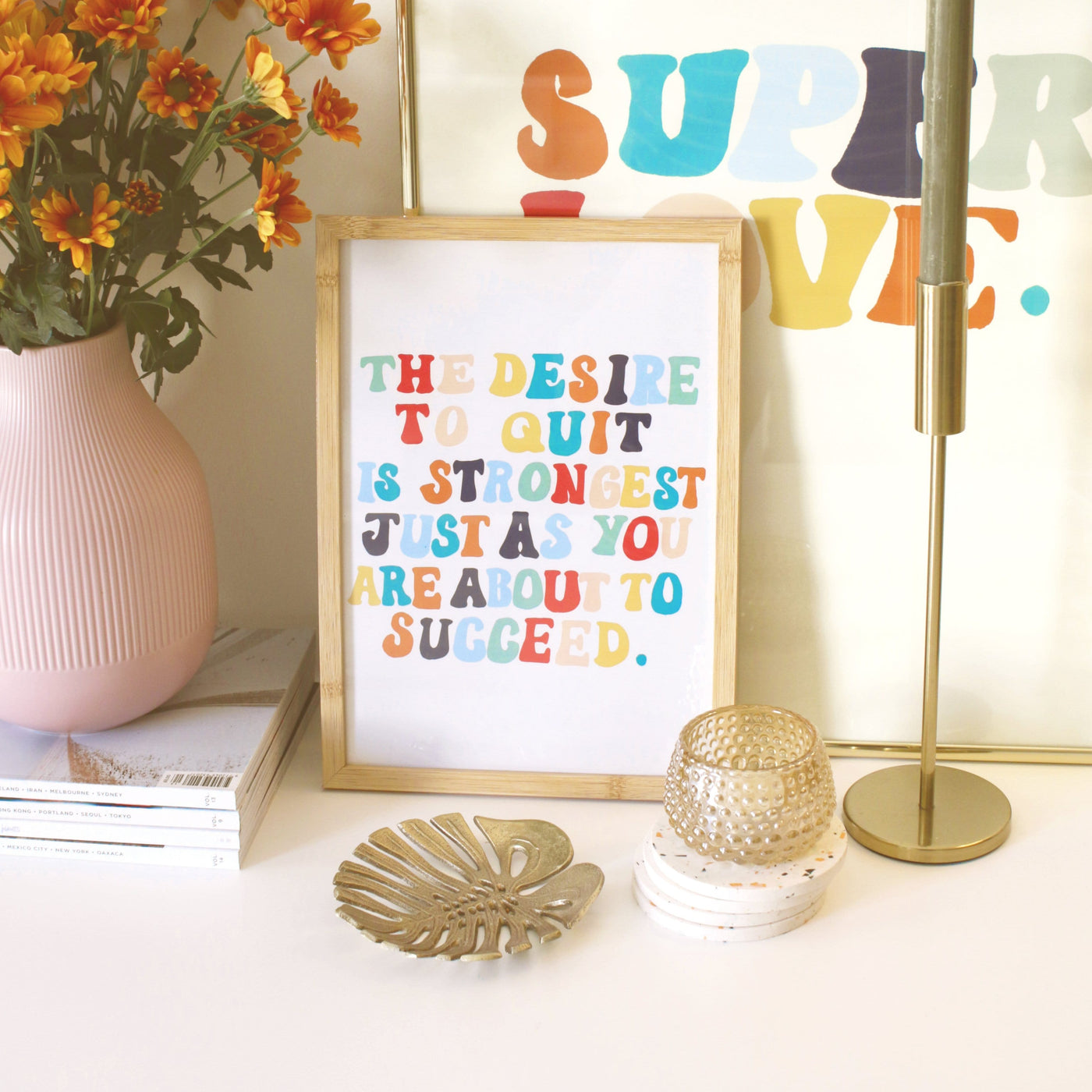 A Hand Lettered Rainbow Typography Motivational Print In A Light Oak Frame On A Desk - Annie Dornan Smith