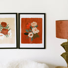 Red Floral Botanical Giclee Print Anemone Flowers On A Deep Red Background In A Black Frame Hanging On The Wall - Annie Dornan Smith