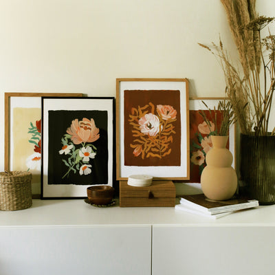 Selection Of Four Floral Giclee Prints On A White Sideboard - Annie Dornan Smith