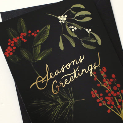 Christmas Botanical Illustrations On A Black Seasons Greetings A6 Card  With Black Envelope - Annie Dornan Smith