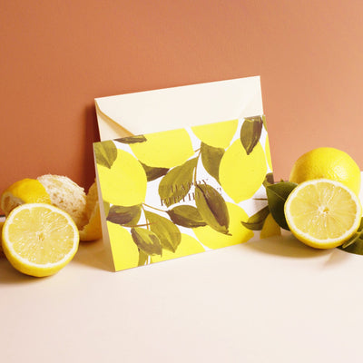 Illustrated Lemon and Green Leaf A6 Card With Happy Birthday In Gold Lettering With Pale Yellow Envelope With Real Lemons - Annie Dornan Smith