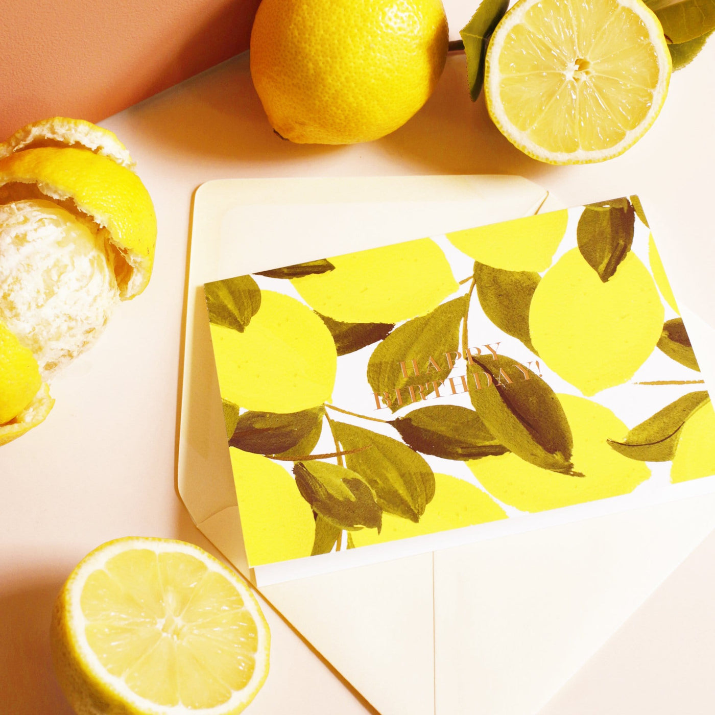 Illustrated Lemon and Green Leaf A6 Card With Happy Birthday In Gold Lettering With Pale Yellow Envelope With Real Lemons  - Annie Dornan Smith
