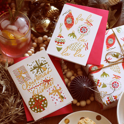 Illustrated Christmas Present A6 Card With Christmas Wishes In Gold Lettering With Red Envelope - Annie Dornan Smith