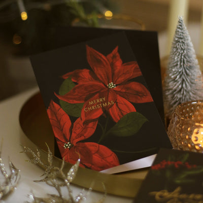 Red Poinsettia Illustration On A Black Merry Christmas Greetings A6 Card  With Black Envelope - Annie Dornan Smith