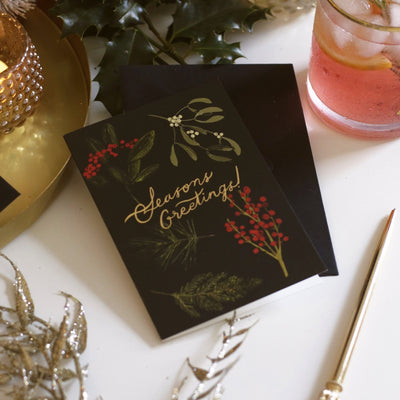 Christmas Botanical Illustrations On A Black Seasons Greetings A6 Card  With Black Envelope - Annie Dornan Smith