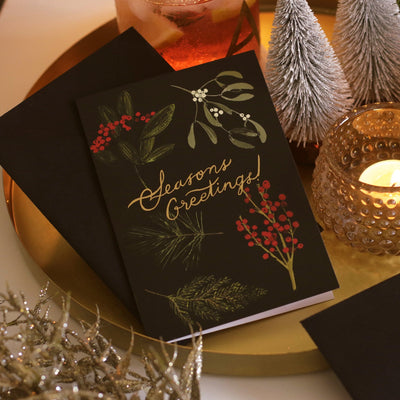 Christmas Botanical Illustrations On A Black Seasons Greetings A6 Card  With Black Envelope - Annie Dornan Smith