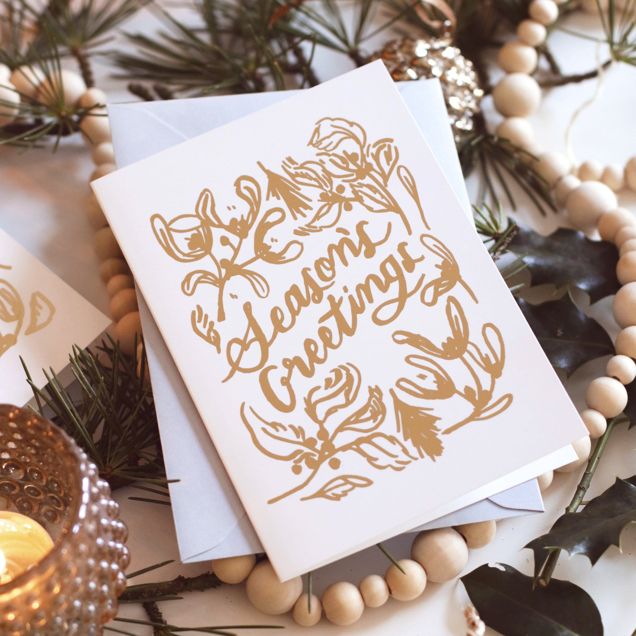 Gold Foiled Mistletoe Seasons Greetings A6 White Car With Grey Envelope - Annie Dornan Smith