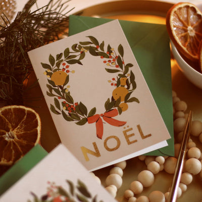Illustrated Christmas Wreath A6 White Card With Gold Noel Lettering With Green Envelope With Christmas Decorations - Annie Dornan Smith