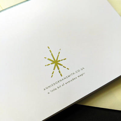 Back Of A Greeting Card With Gold Star And Web Address - Annie Dornan Smith