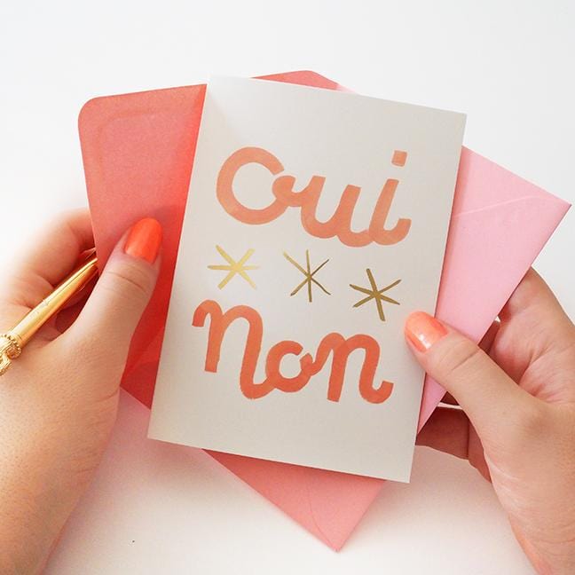 Typographic A6 Card With The Words Oui Non And Three Stars In Pink With a Pale Pink Envelope - Annie Dornan Smith