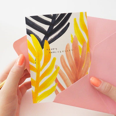 Colourful Palm Leaf A6 Card With Happy Anniversary Written in Gold With A Pale Pink Envelope - Annie Dornan Smith