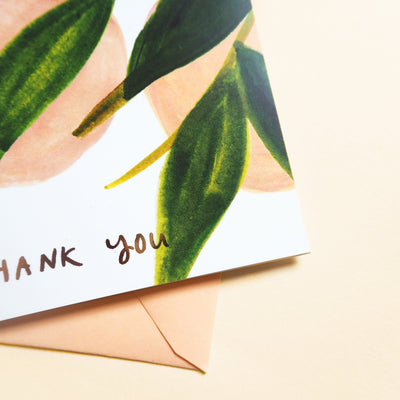 Illustrated Peach and Green Leaf Card With Thank You In Gold Lettering With Peach Envelope - Annie Dornan Smith