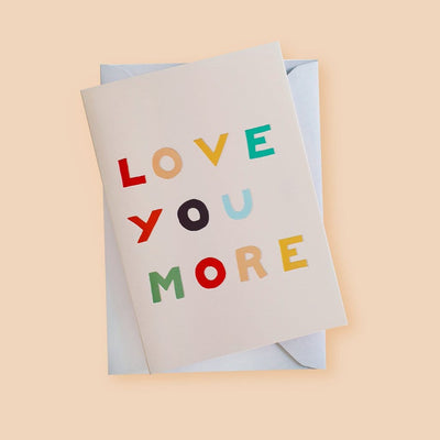 A Hand Lettered Rainbow Typography Card Reading Love You More With Pale Grey Envelope - Annie Dornan Smith