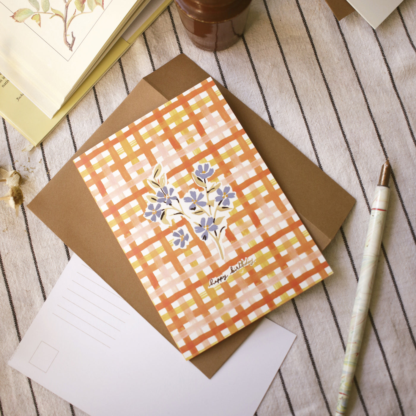 gingham floral  birthday card on a cotton tablecoth